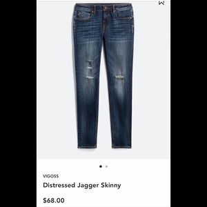 Distressed dark wash skinny jeans